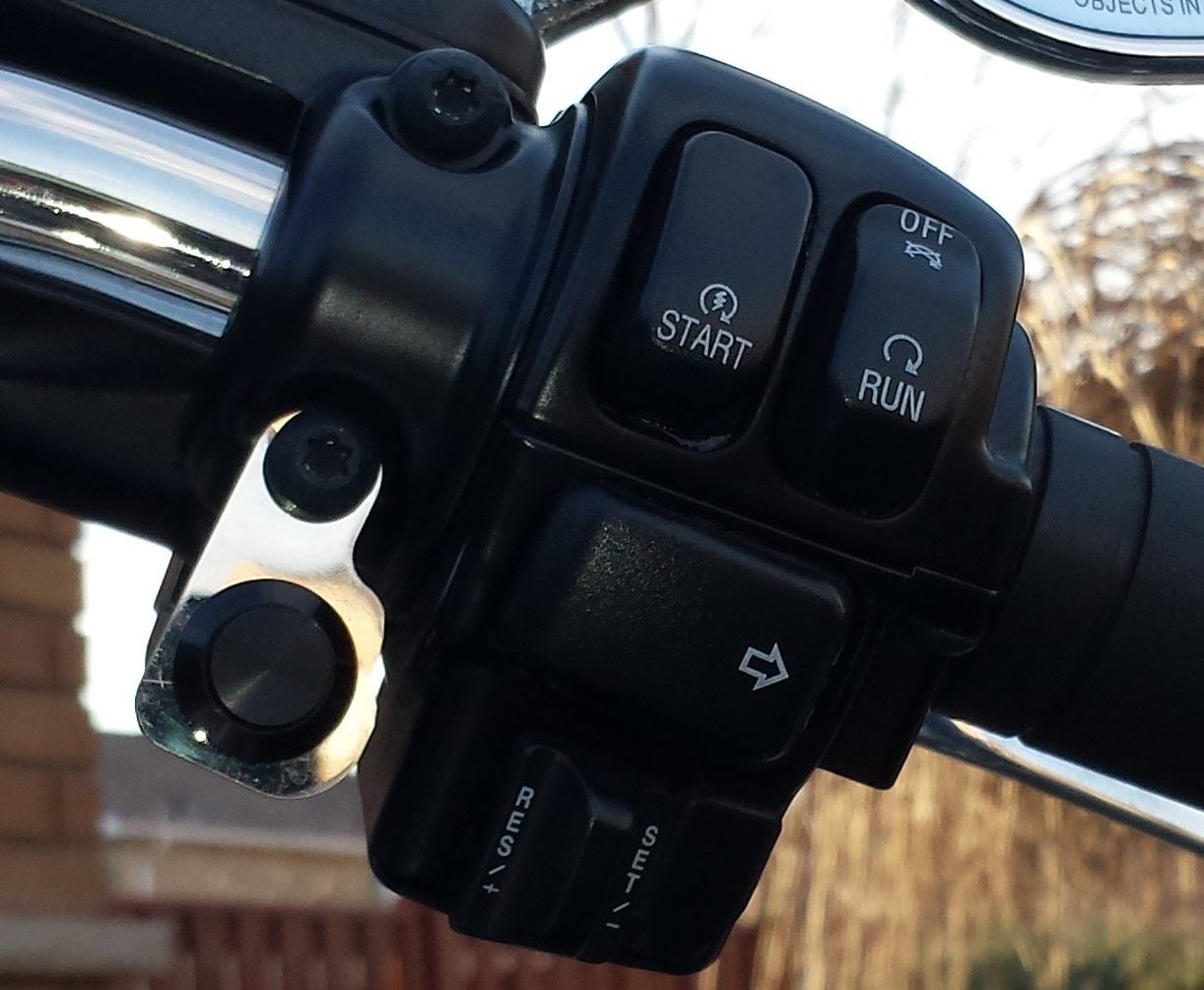 Remote garage door opener for motorcycles